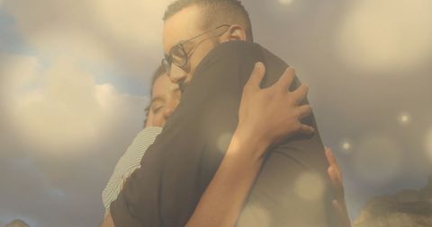 Warm Embrace Under Daylight with Bokeh Effect