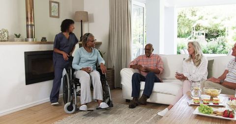 Senior Friends Socialize in Comfortable Living Room