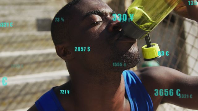 A tired athlete drinks water, overlaid with animated currency symbols and changing numbers. Ideal for use in financial and sports contexts, illustrating the connection between sports performance and financial growth or expenses. Can also be used in articles about athlete sponsorship, business investments in sports, or maintaining hydration and wellness during exercise.