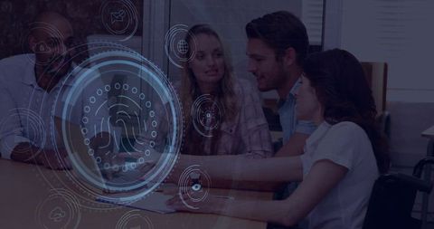 Tech Team Reviewing Digital Security on Office Laptop