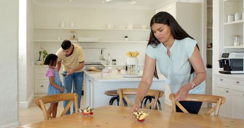 Family Breakfast Preparation in Modern Kitchen Setting