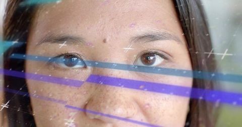 Portrait of Mid-Adult Asian Woman With Digital Data Overlay