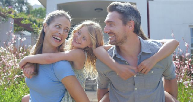 Happy Family Enjoying Outdoor Time Together with Piggyback Rides - Download Free Stock Images Pikwizard.com