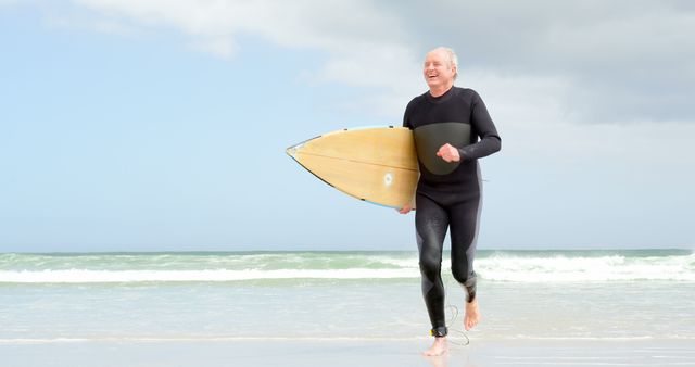 Senior Man Carrying Surfboard on Beach - Download Free Stock Images Pikwizard.com