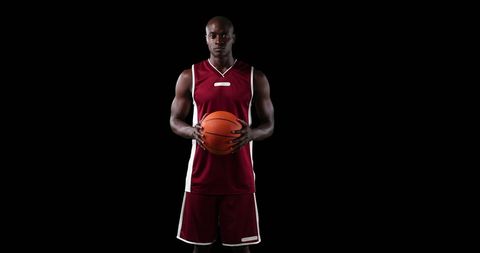 Athletic Young Male Basketball Player Holding Ball - Download Free Stock Images Pikwizard.com