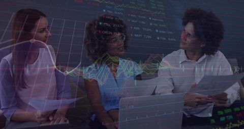 Colleagues Discussing Stock Market Data in Office Environment