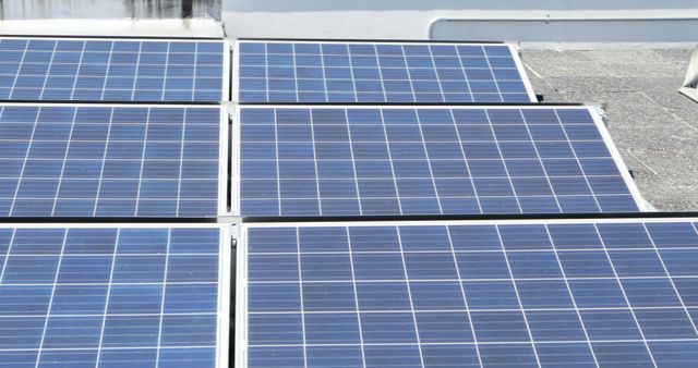 Close-Up of Solar Panels on Rooftop During Daytime - Download Free Stock Images Pikwizard.com