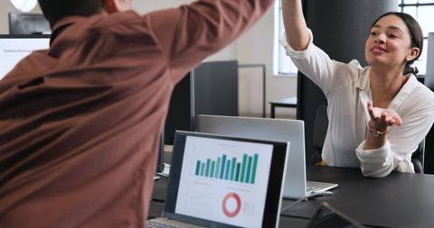 Collaborative Multiracial Teamwork in Modern Office Environment