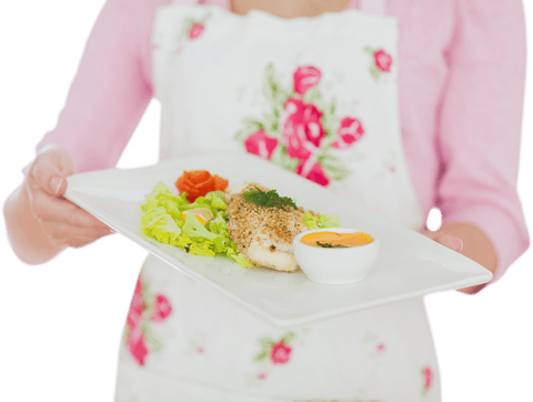 Woman Presenting Transparent Gourmet Dish with Floral Apron