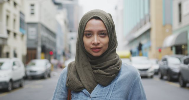 Young Muslim Woman Wearing Hijab Standing on Urban Street - Download Free Stock Images Pikwizard.com