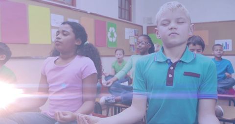 Diverse Schoolchildren Practicing Yoga and Meditation in Classroom - Download Free Stock Images Pikwizard.com