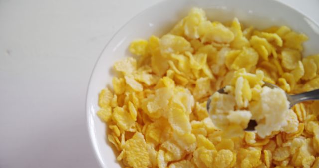 Close-Up of Breakfast Cornflakes with Milk in Bowl - Download Free Stock Images Pikwizard.com