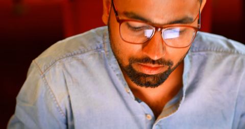 Overhead View of Young Professional Working Diligently