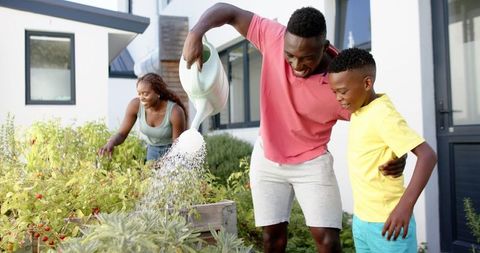 Family Gardening Together in Home Garden Bonding with Nature