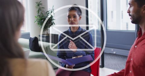 Business Team Collaborating with Digital Email Overlay