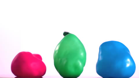 Colorful Water Balloons Bouncing in Slow Motion