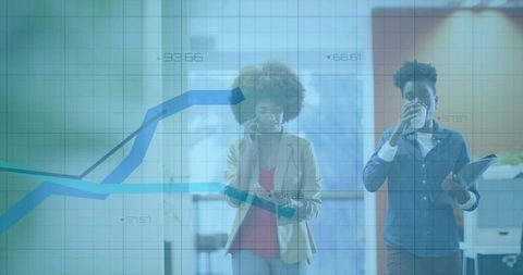 Modern Business Team Analyzing Line Chart on Mobile at Office