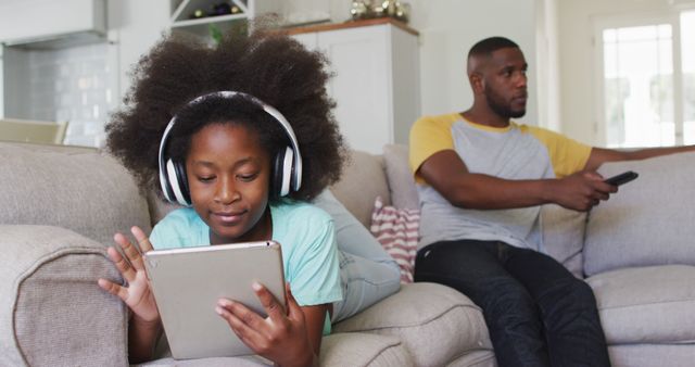 Father and Daughter Enjoying Technology Together at Home - Download Free Stock Images Pikwizard.com