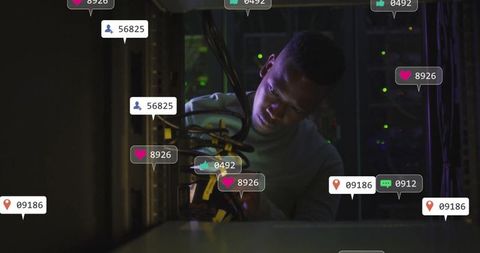 Technician maintaining server cables with social notification overlays