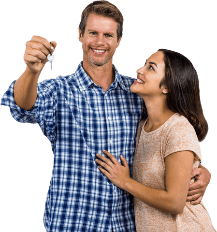 Happy couple embracing with transparent keys of new home