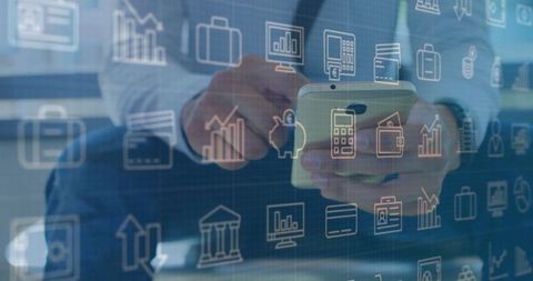 Business Professional Using Smartphone Amidst Digital Financial Icons