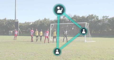 Youth soccer team forming defensive wall with tactical network overlay for strategy