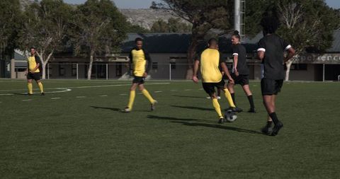 Soccer Team in Dynamic Play Focusing on Strategic Ball Movement