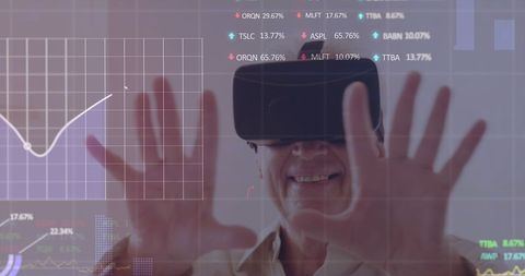 Senior Male Enjoying Virtual Reality Technology with Smiling Expression