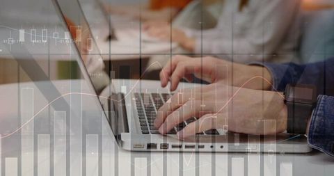 Hands Typing on Laptop with Financial Charts Overlay, Analyzing Data for Collaboration