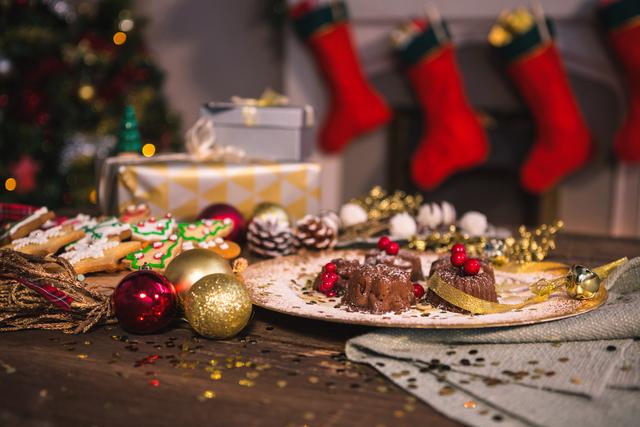 Close-up of various christmas desserts on wooden table