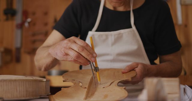 Craftsman Measuring Violin Wood in Workshop - Download Free Stock Images Pikwizard.com