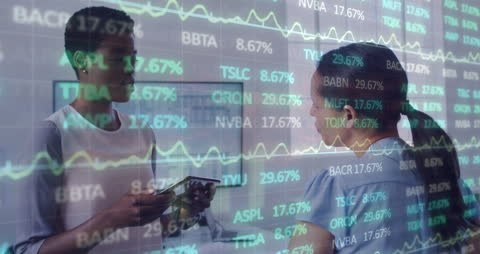 Businesswomen Analyzing Financial Data on Digital Display in Office