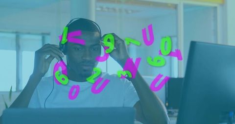 Analyst Monitoring Data with Virtual Neon Numbers Display