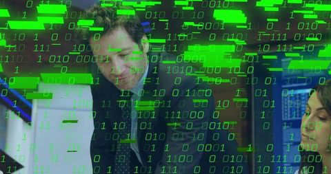 Business Team Analyzing Coding with Binary Overlays - Download Free Stock Images Pikwizard.com