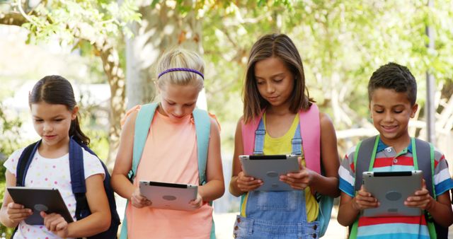 School kids using digital tablet at school campus 4k