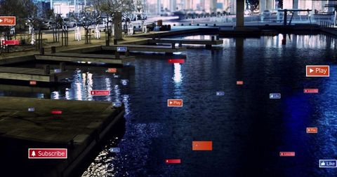 Urban waterfront at night showing floating social media badges over reflective harbor dock