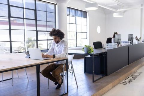 Modern office team collaboration with technology and open spaces