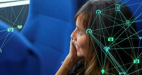 Woman communicating on phone with digital connectivity network overlay traveler