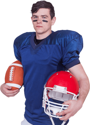 American football player holding ball and helmet with focus