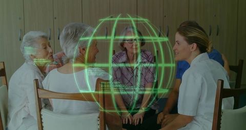 Nurse engaging with seniors in digital health discussion