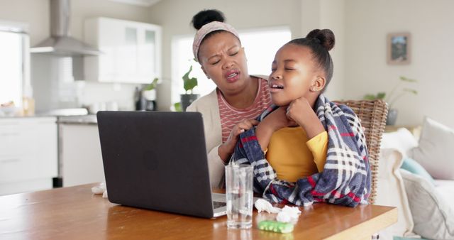 Concerned Mother Cares for Sick Daughter at Home - Download Free Stock Images Pikwizard.com