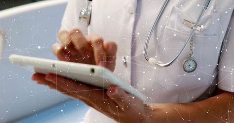 Nurse Engaging with Telemedicine Technology on Digital Tablet