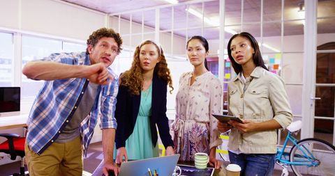 Diverse Professionals Engaged in Collaborative Office Discussion - Download Free Stock Images Pikwizard.com