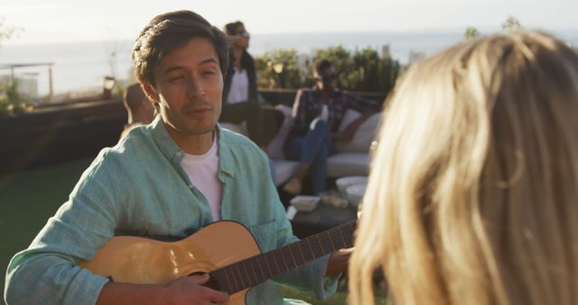 Friends Enjoying Music Together Outdoors at Sunset - Download Free Stock Images Pikwizard.com