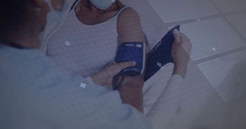 Healthcare professional checking vital signs in modern clinic