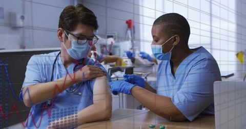 Healthcare professional receiving vaccine injection at clinic