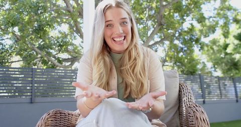 Happy Young Woman Enjoying Relaxing Day Outdoors