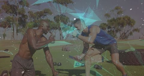 Athletes Engaged in Intense Outdoor Kettlebell Training