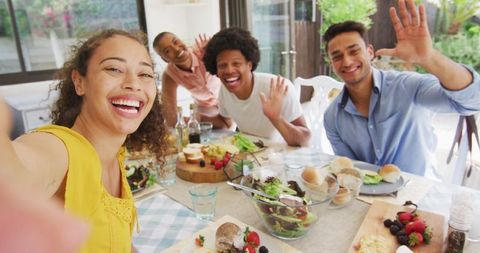 Friends Enjoying an Outdoor Dining Experience Together
