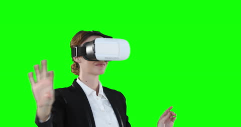 Woman Using VR Headset Interacting in Virtual Reality